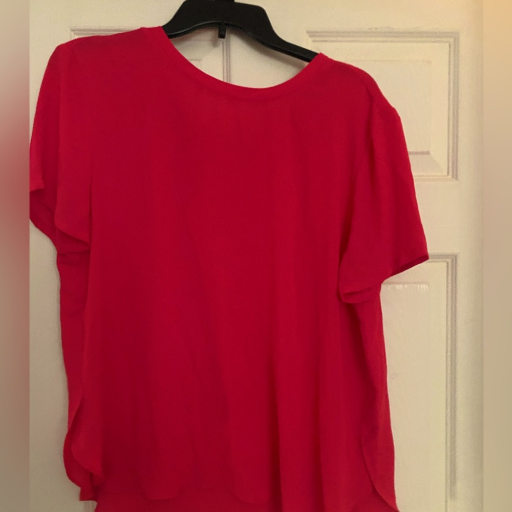 Silky coral blouse.